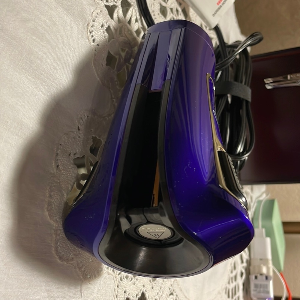 Ion titanium pro automatic curler purple.